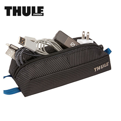 Thule Crossover 2 Travel Kit Pouch with charging cables and electronics organized inside.