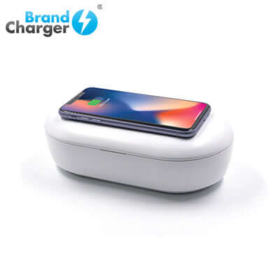 BrandCharger 2-in-1 Smart UV Sterilizer with Wireless Charger sanitizing a smartphone.