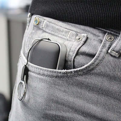 BrandCharger Nano Lite Bluetooth Wireless Speaker in a pocket, perfect for corporate gift.