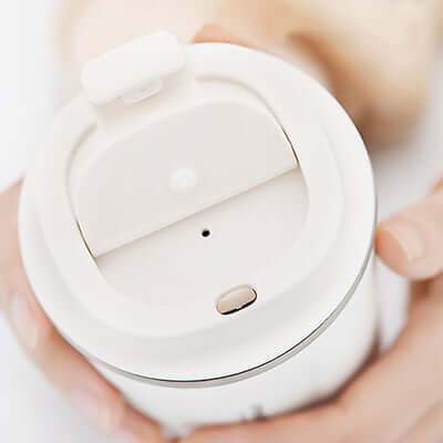 Close-up of the flip-to-open lid of the ENDO 380ML Double Stainless Steel Thermal Coffee Mug.