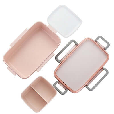 Microwave Ready Bento Lunch Box in pink and white with separate compartments for meal prep and on-the-go lunches.