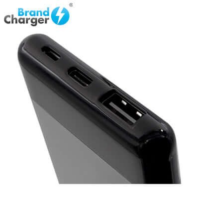Close-up of the BrandCharger 5000mAh Powerbank showing USB ports and sleek design for portable charging.