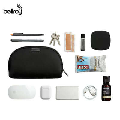Bellroy Classic Pouch with essentials like pens, keys, and toiletries, ideal for organizing personal items and a great corporate gift.