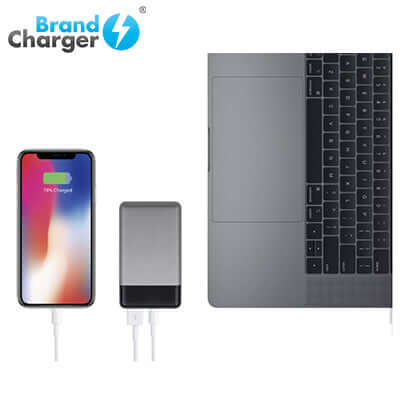 BrandCharger 10000mAh Powerbank XL charging smartphone and laptop, sleek design, ideal corporate gift.