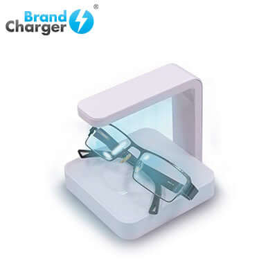 BrandCharger Apollo UV Sterilizer Wireless Charger sterilizing glasses on a modern charging pad.