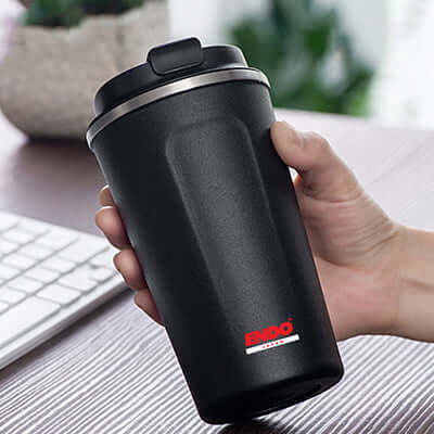 ENDO 500ML Double Stainless Steel Thermal Coffee Mug held in hand, ideal as a corporate gift.