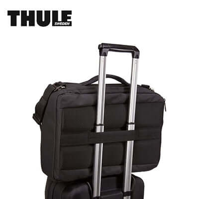 Thule Crossover 2 Convertible Laptop Bag 15.6'' securely attached to luggage handle.