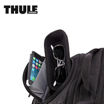Thule Crossover 32L Laptop Backpack featuring a crushproof SafeZone compartment for sunglasses and electronics.
