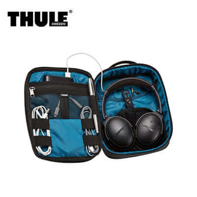 Thule Subterra Powershuttle Electronics Organizer Plus with headphones and cables inside.