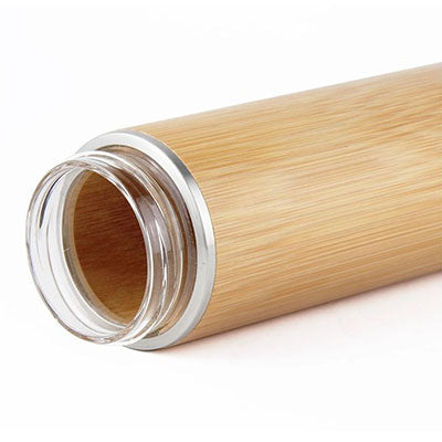 Close-up of Eco Friendly BPA Free Bamboo Glass Water Bottle showcasing the bamboo exterior and glass interior.