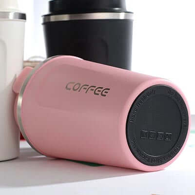 Stainless Steel coffee Thermo Mug in pink color, perfect for keeping drinks hot on the go.