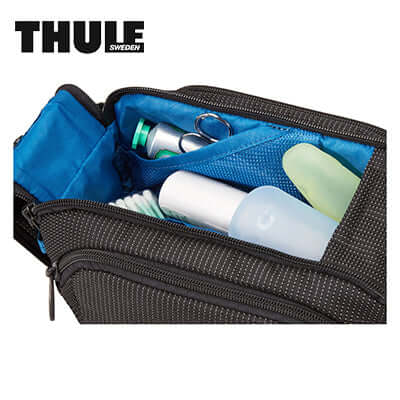 Thule Crossover 2 Toiletry Bag showcasing organized toiletries and internal pockets.