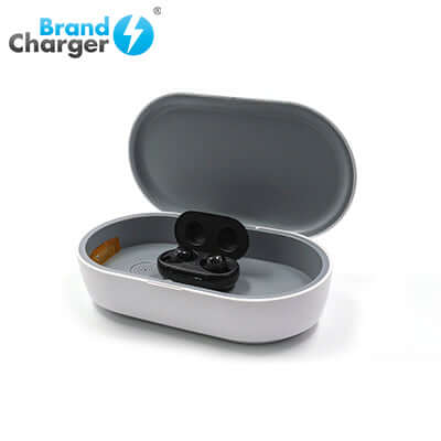 BrandCharger 2-in-1 Smart UV Sterilizer with Wireless Charger and wireless earbuds in charging case.