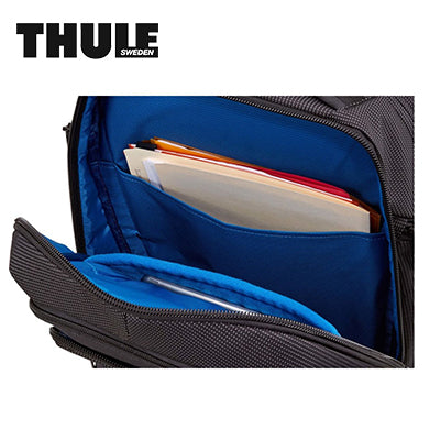 Thule Crossover 2 30L Laptop Backpack showcasing its organized interior with blue compartments for documents.