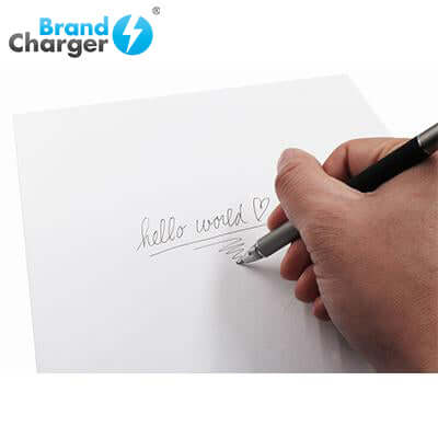 BrandCharger Styllo Multi Function Pen writing on paper with the text 'hello world'.