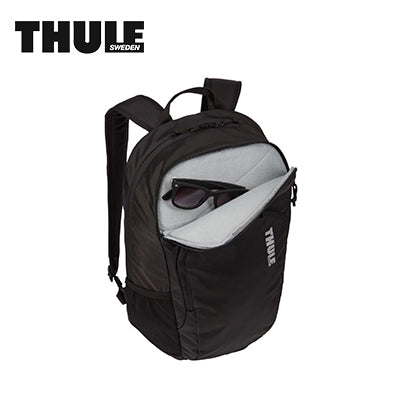 Thule Achiever 20L Laptop Backpack with sunglasses in pocket, perfect for corporate gifts.