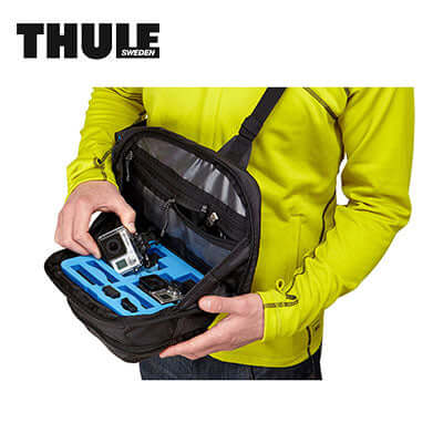Thule Legend Gopro Sling Pack with GoPro camera in a stylish, organized carrying case for adventure enthusiasts.
