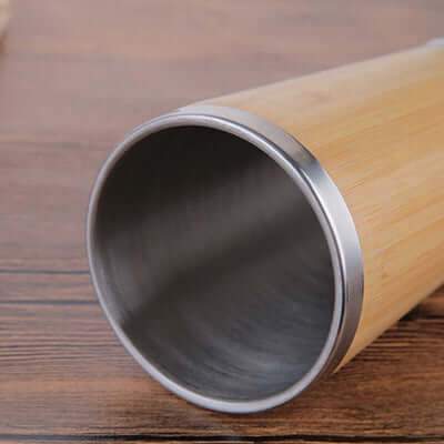 Inside view of Bamboo Stainless Steel Coffee Mug with Leak-Proof Cover showcasing stainless steel interior.