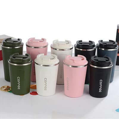 Various Stainless Steel coffee Thermo Mugs in different colors, ideal for travel and as a Corporate Gift.