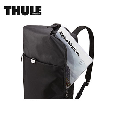 Thule Spira Backpack showing sleek design with magazine inside, perfect for corporate gifts and everyday use.
