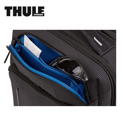 Thule Crossover 2 Convertible Laptop Bag 15.6'' showing interior pocket with sunglasses and documents.