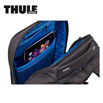 Thule Crossover 2 30L Laptop Backpack showing tablet compartment with blue lining for organized storage.