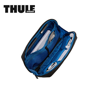 Thule Crossover 2 Multi-Purpose Travel Organizer with organized electronics and accessories inside.