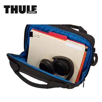Thule Crossover 2 13″ Laptop Bag interior showing organizational pockets and headphones.