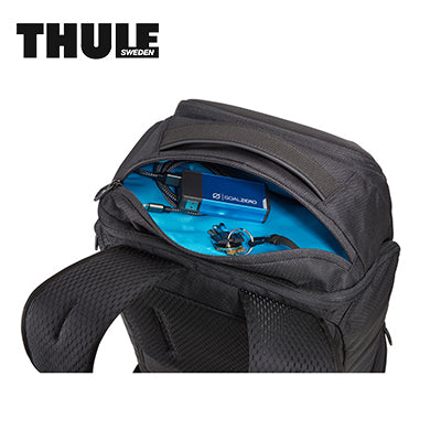Thule Accent 28L Laptop Backpack interior view with organized compartments and gear.