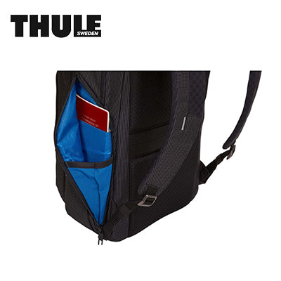Thule Crossover 2 30L Laptop Backpack showing organizational pocket with a passport and blue lining.