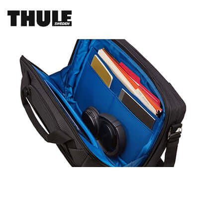 Interior view of Thule Crossover 2 15.6″ Laptop Bag with blue lining and organized storage compartments.