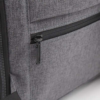 Close-up of the zippered pocket on the BrandCharger Marco Polo Toiletry Bag, showcasing durable fabric.
