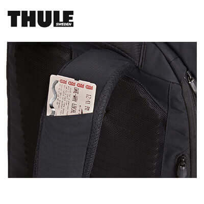 Thule Paramount Backpack 27L side pocket holding tickets for easy access and convenience.