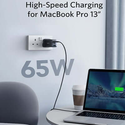 Anker PowerPort III 3-Port 65W charging a MacBook Pro 13'' with 65W output for fast charging.