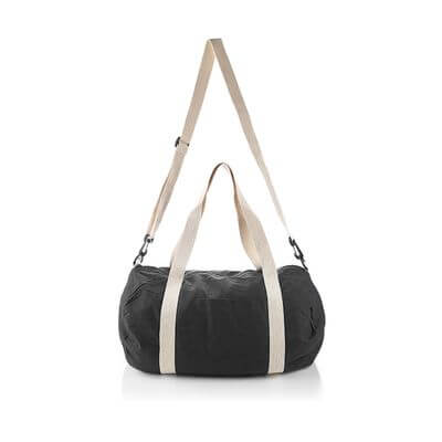 Cotton Barrel Duffel bag in black with cream straps, perfect for travel and gym use.