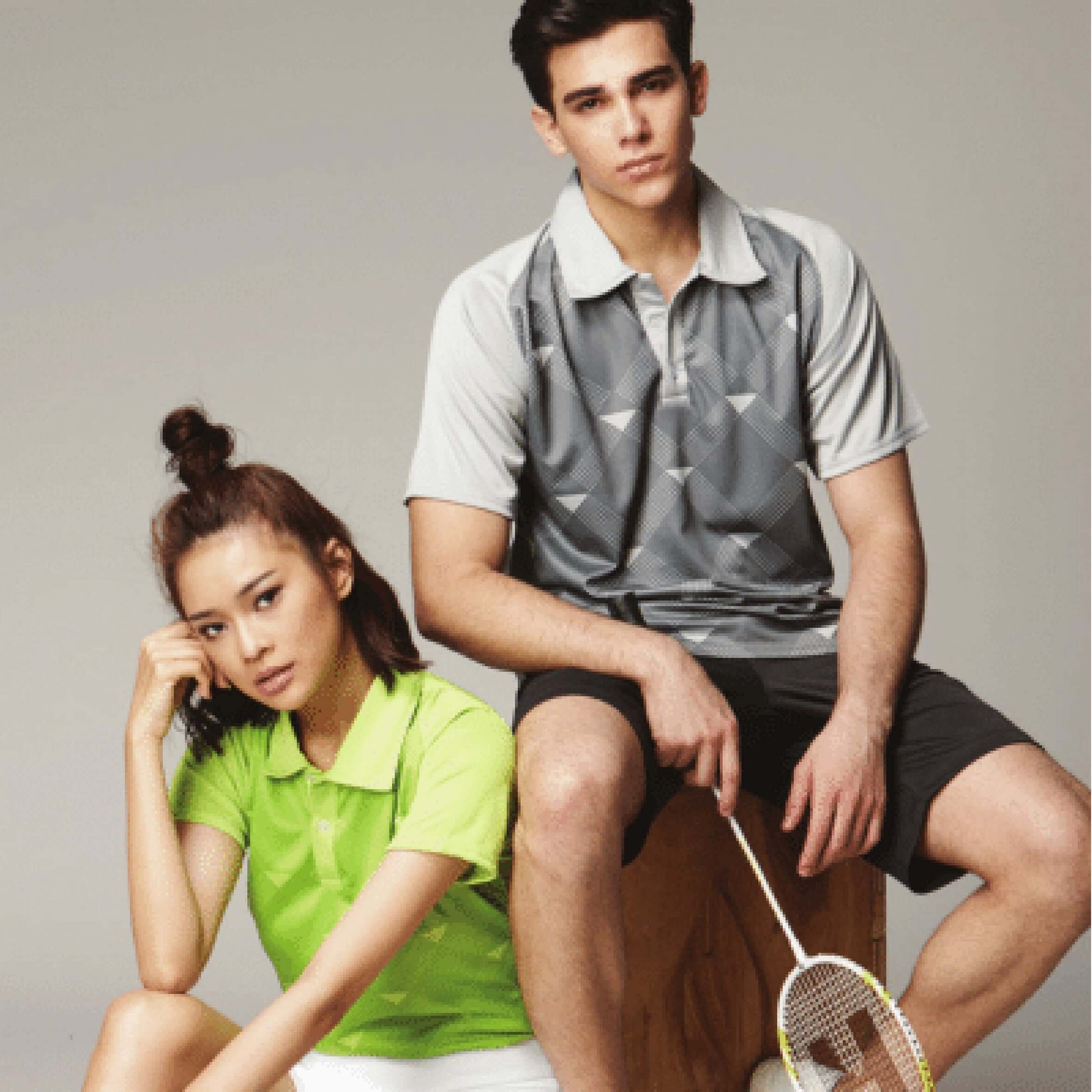 Crossrunner 2800 Sublimated Polo T-Shirt worn by models showcasing a stylish and sporty look.