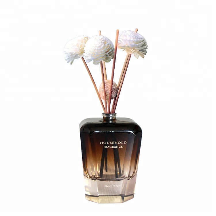 Bamboo Stick Essential Oil Fragrance Reed Diffusers in a stylish glass bottle with decorative sticks.