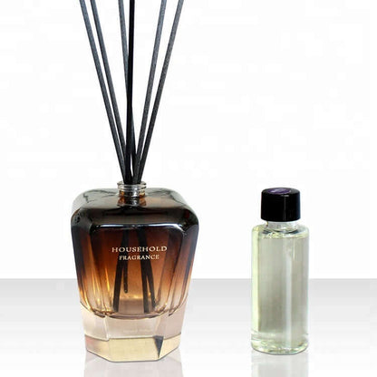 Bamboo Stick Essential Oil Fragrance Reed Diffusers next to a fragrance oil bottle.