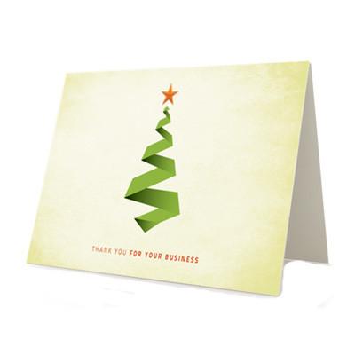 Folded thank-you card with a green tree design