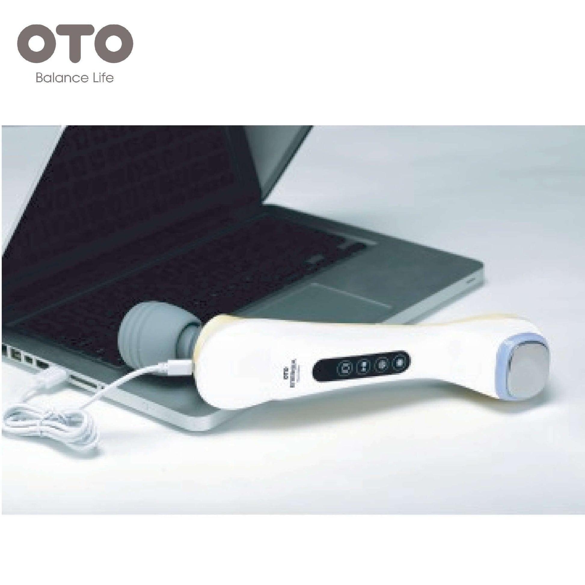 OTO Energia beauty device on a laptop, perfect for skincare routines and corporate gift.
