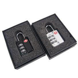 TSA Lock in black and silver finishes, packaged elegantly as a corporate gift, showcasing security and style.