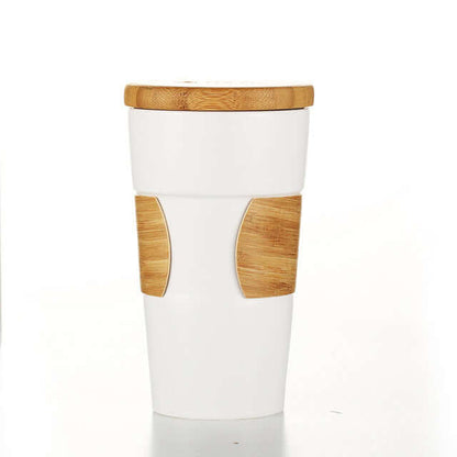 Eco Friendly Ceramic Mug with Bamboo Lid and Sleeve featuring a stylish bamboo design for hot beverages.