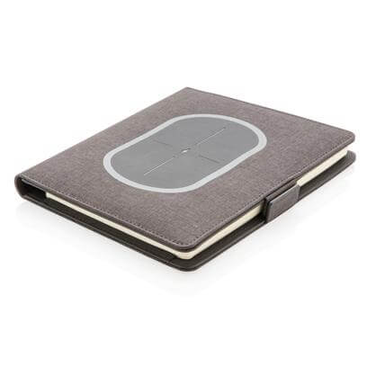 A5 Notebook with Wireless Charger 5W in grey fabric cover featuring a charging pad on the front.