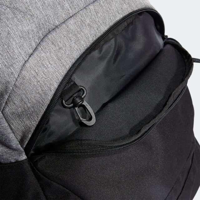 Close-up of the zipper pocket on the adidas Casual Back Pack, showcasing its functional design and stylish look.