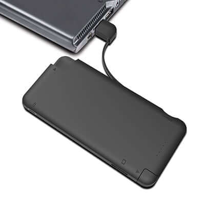 BrandCharger iQ+ Powerbank with Syncing Cable, Card Reader and Portable Data Storage connected to a laptop.