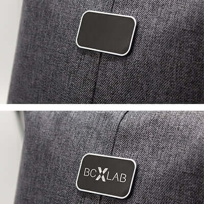 Logo patch showing BCXLAB design on a fabric surface, ideal for branding corporate gifts.