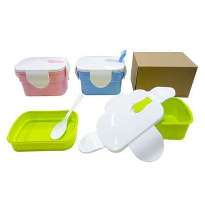 2-Tier Rectangular Lunch Box with spoon in pink, blue, and green, packaged in a Kraft box.