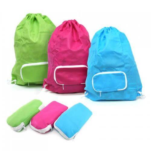 Foldable Drawstring Bag available in Pink, Blue, and Green, ideal for grocery shopping and corporate gifts.