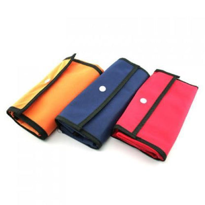 Foldable Shopping Bag with Plastic Buttons in vibrant colors: orange, blue, and red.