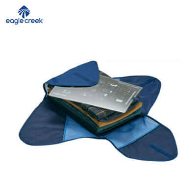 Eagle Creek Pack-It Reveal Garment Folder displaying folded clothes, ideal for corporate gift and wrinkle-free travel.